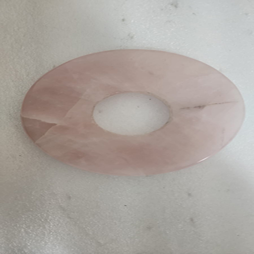 5.5 by 5.5 inches with hole 1.75 rose quartz round platter